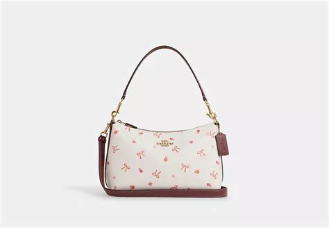 bow print coach|coach clara shoulder bag with bow print.